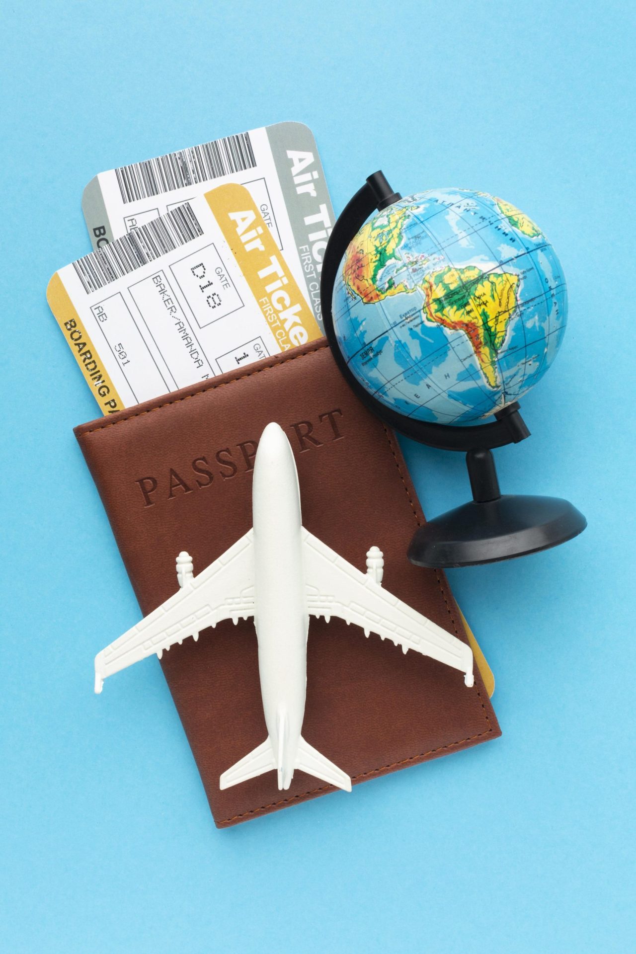 Passport and airline tickets arranged for corporate international travel planning